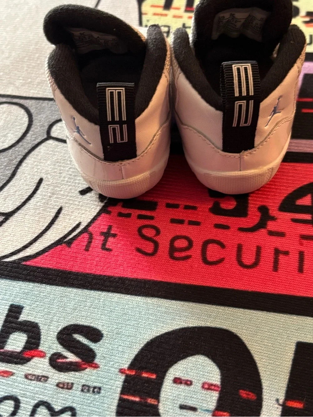 Jordan 11 retro Columbia White and Light Blue High-Top Sneaker